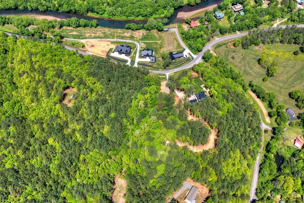 Lot 4 Grassy Creek Road Copperhill, TN 37317 - Photo 1 of 25 a view of a house with a park
