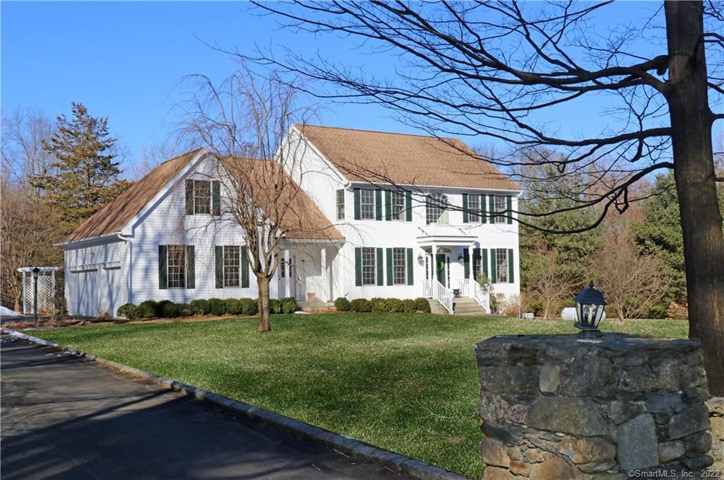 8 Mt Nebo Road Newtown, CT 06470 - Photo 1 of 1 a front view of a house with a garden