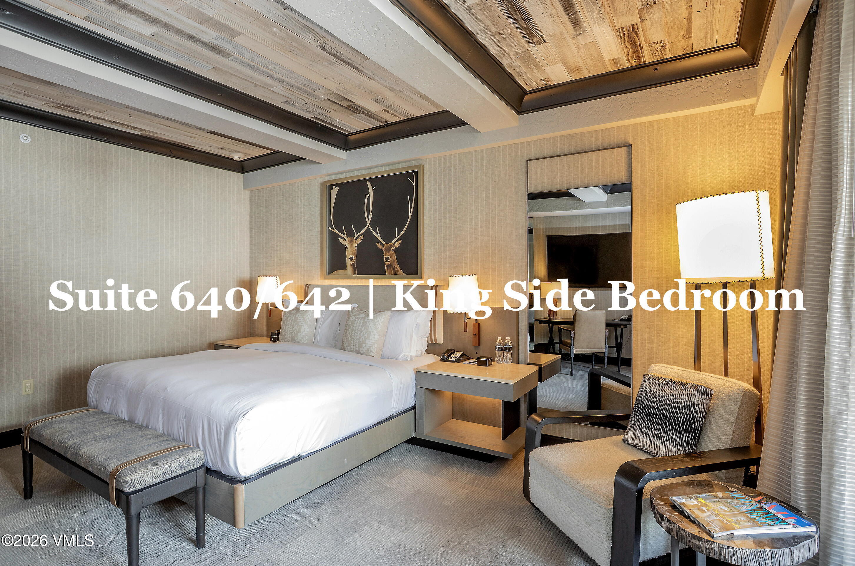 130 Daybreak Ridge Road, Unit HS640 Avon, CO 81620 - Photo 19 of 54 a bedroom with furniture and a potted plant