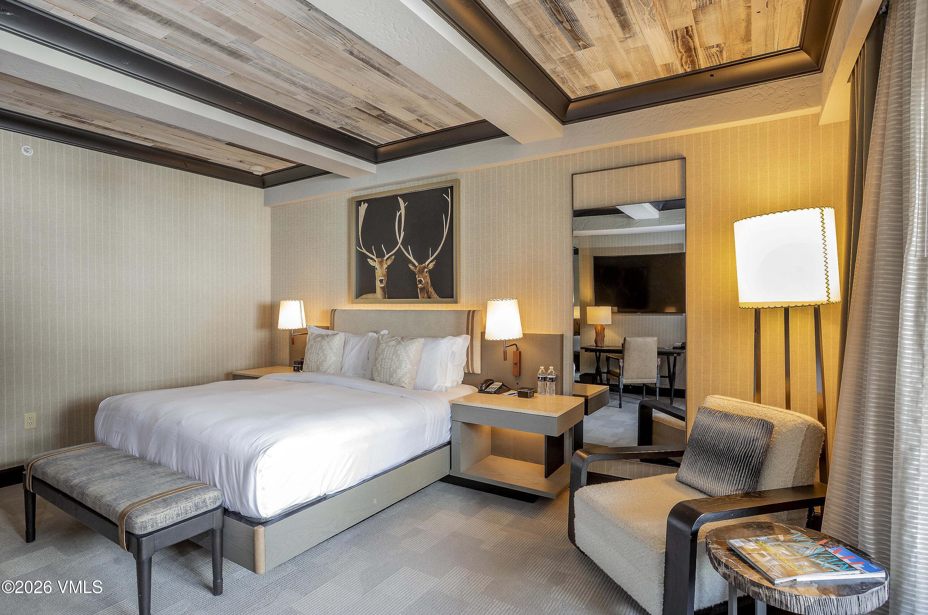 130 Daybreak Ridge Road, Unit HS640 Avon, CO 81620 - Photo 20 of 54 a bedroom with furniture and a potted plant