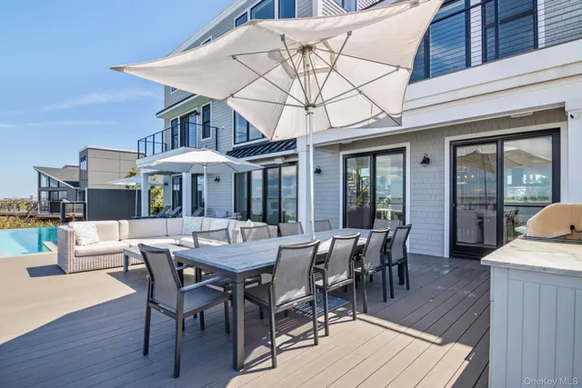 an aerial view of a house with a lake view