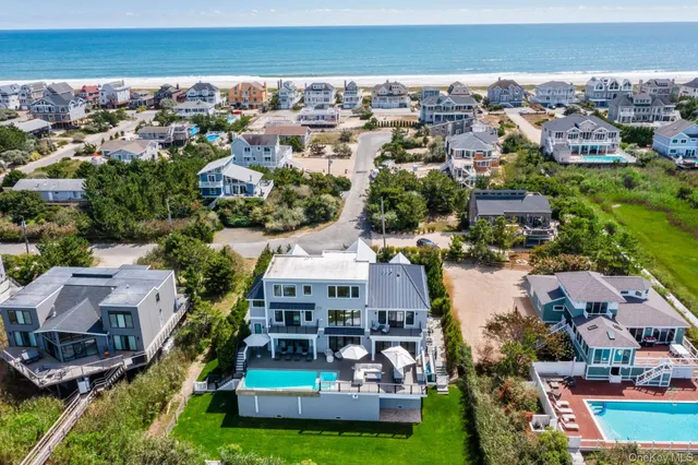 an aerial view of a house with a garden