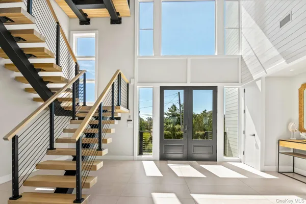a living room with fireplace furniture and a flat screen tv