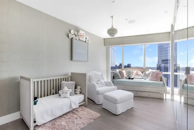 a view of a lake with houses in the background