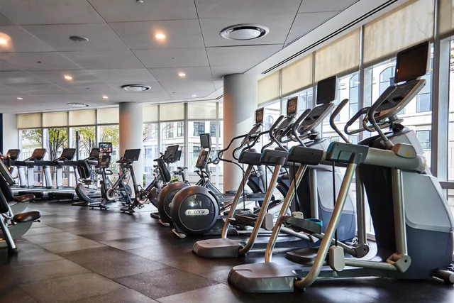 a view of lobby with furniture and wooden floor
