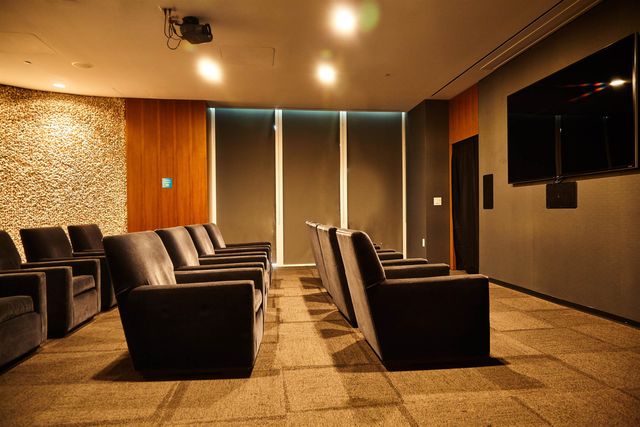 a room with gym equipment and a large window