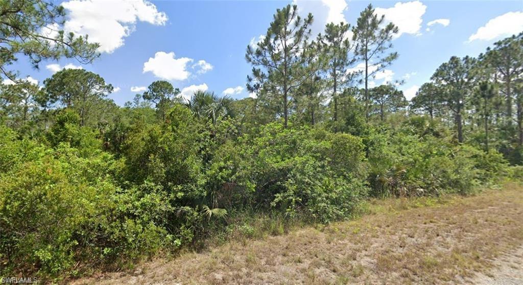 381 Walsh Circle Lehigh Acres, FL 33920 - Photo 3 of 3 a view of a garden