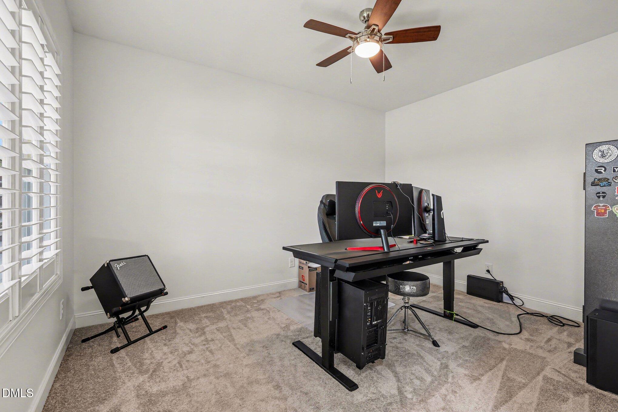 432 Seabring Lane Raleigh, NC 27603 - Photo 18 of 29 a view of a workspace with a window