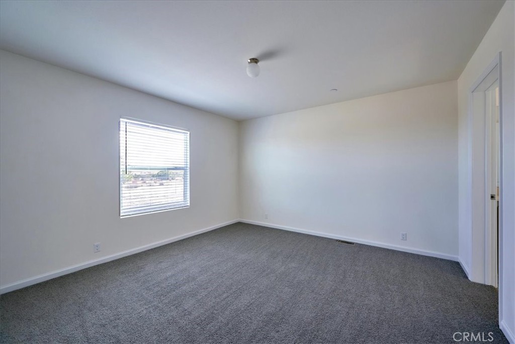 12012 Lager Road Phelan, CA 92371 - Photo 17 of 35 an empty room with a window