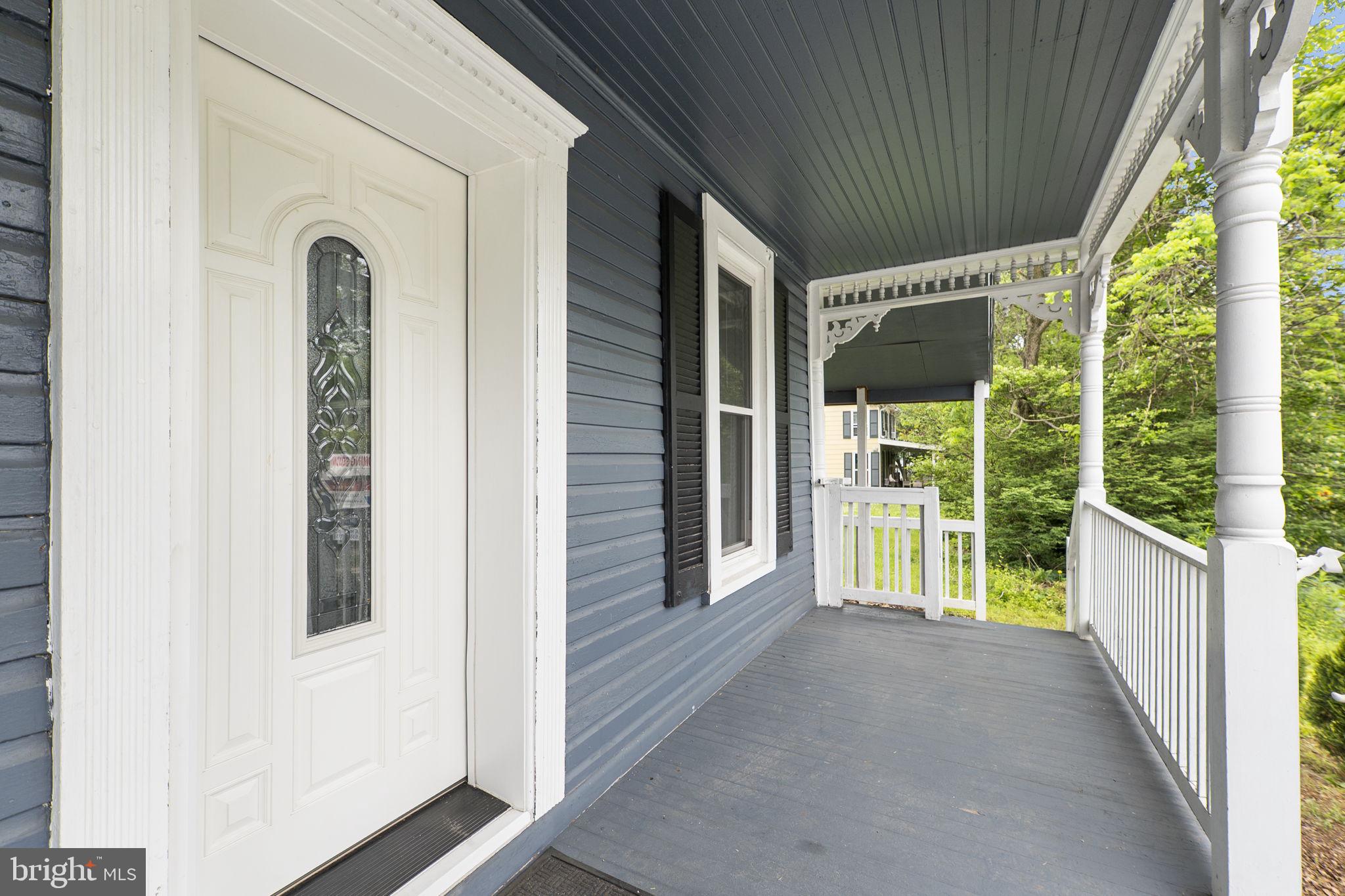 26001 Frederick Road Clarksburg, MD 20871 - Photo 3 of 46 a view of front door and porch