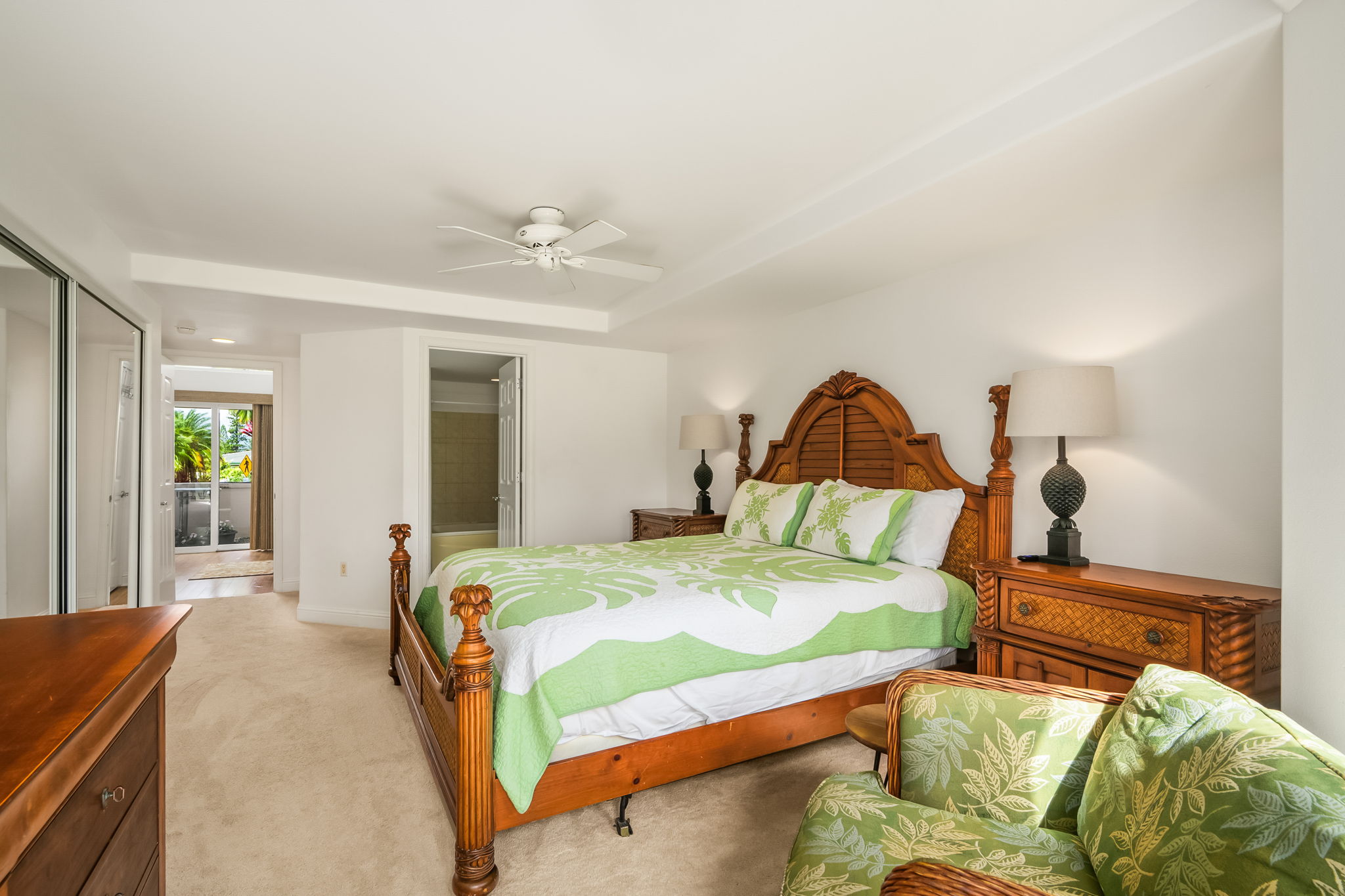 4141 Lei O Papa Road, Unit 6 Princeville, HI 96722 - Photo 16 of 26 a bedroom with a bed a couch and dresser