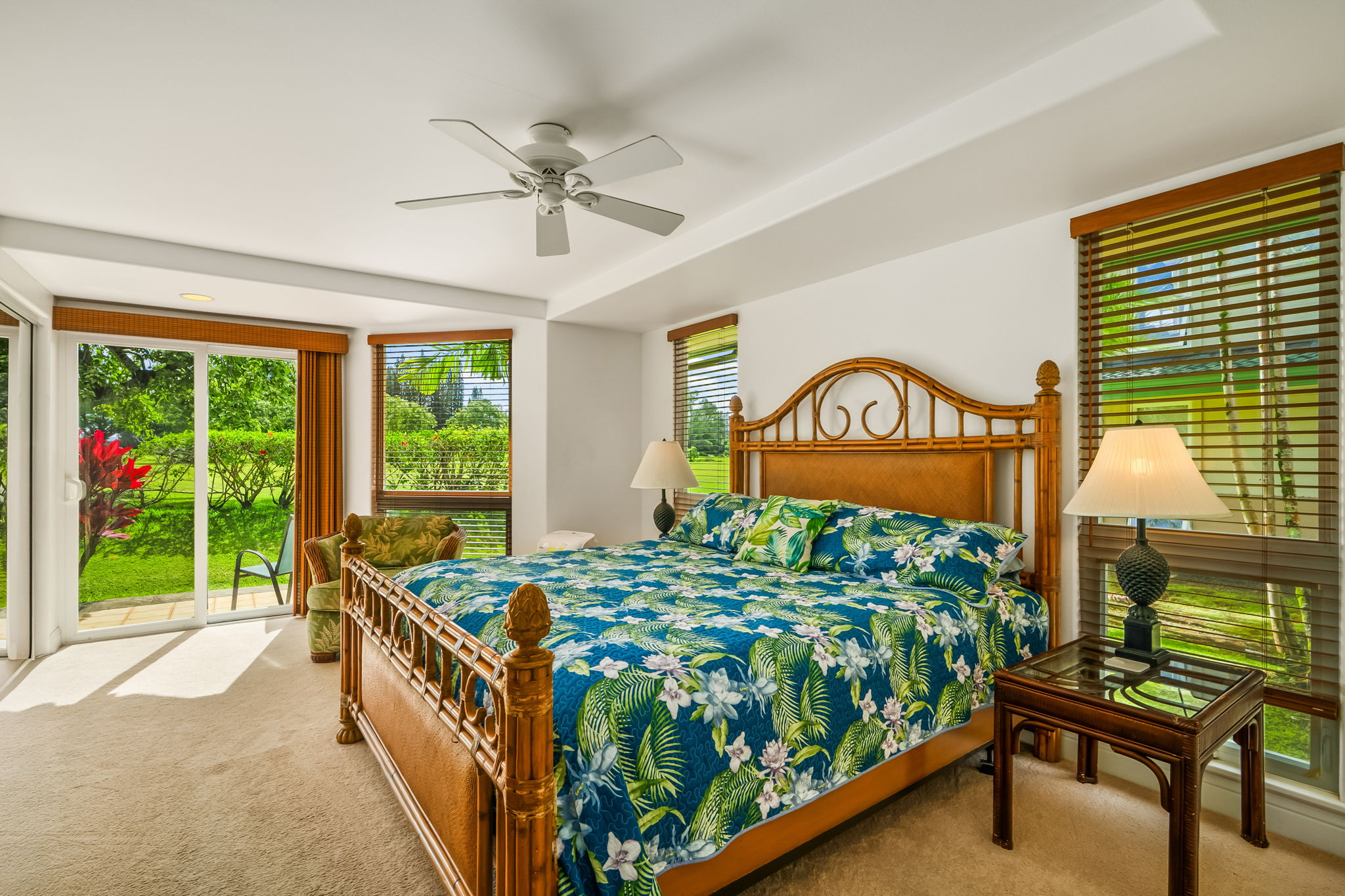 4141 Lei O Papa Road, Unit 6 Princeville, HI 96722 - Photo 19 of 26 a bed sitting in a bedroom next to a window