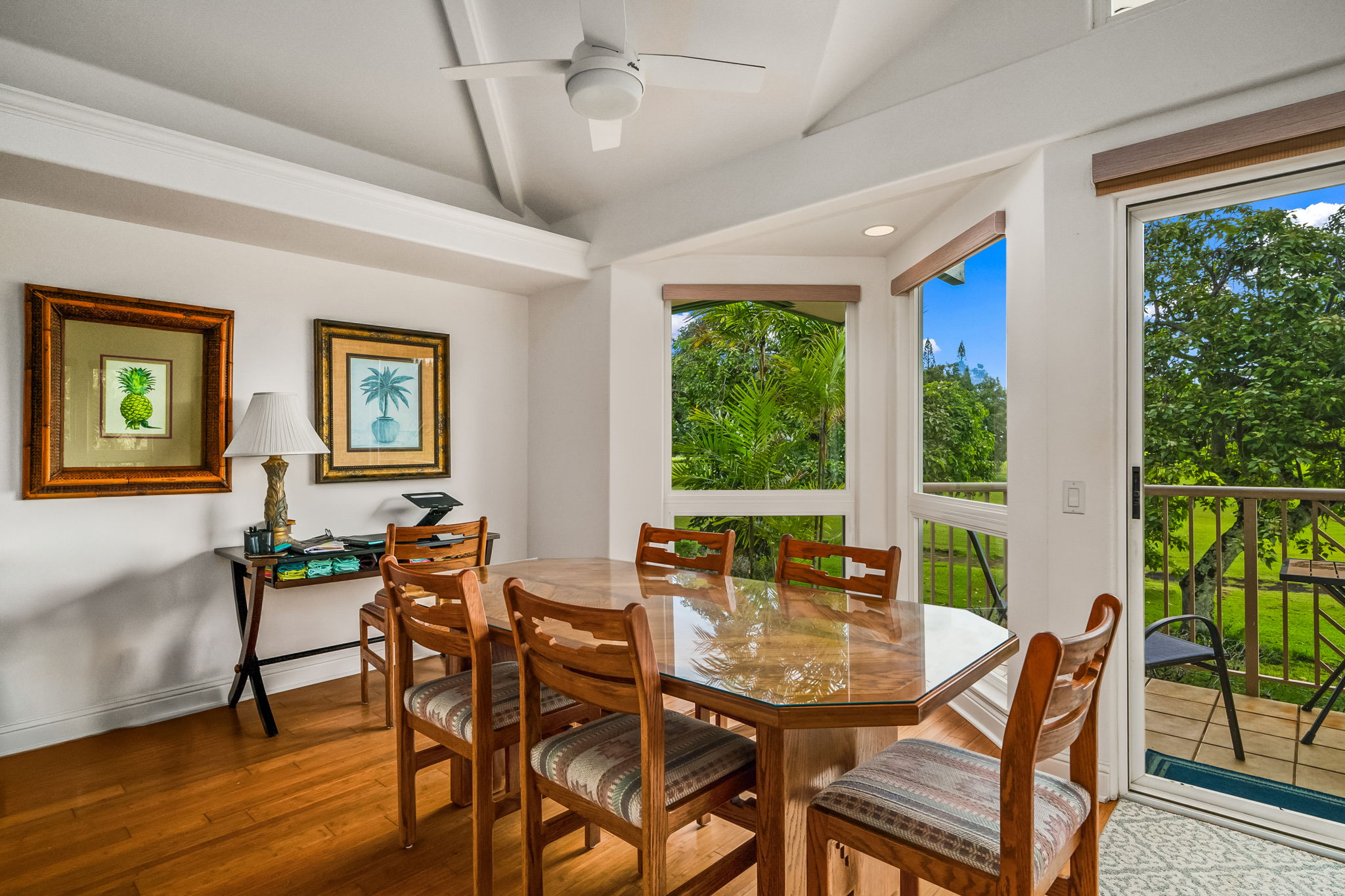 4141 Lei O Papa Road, Unit 6 Princeville, HI 96722 - Photo 7 of 26 a dining room with furniture a rug and a large window