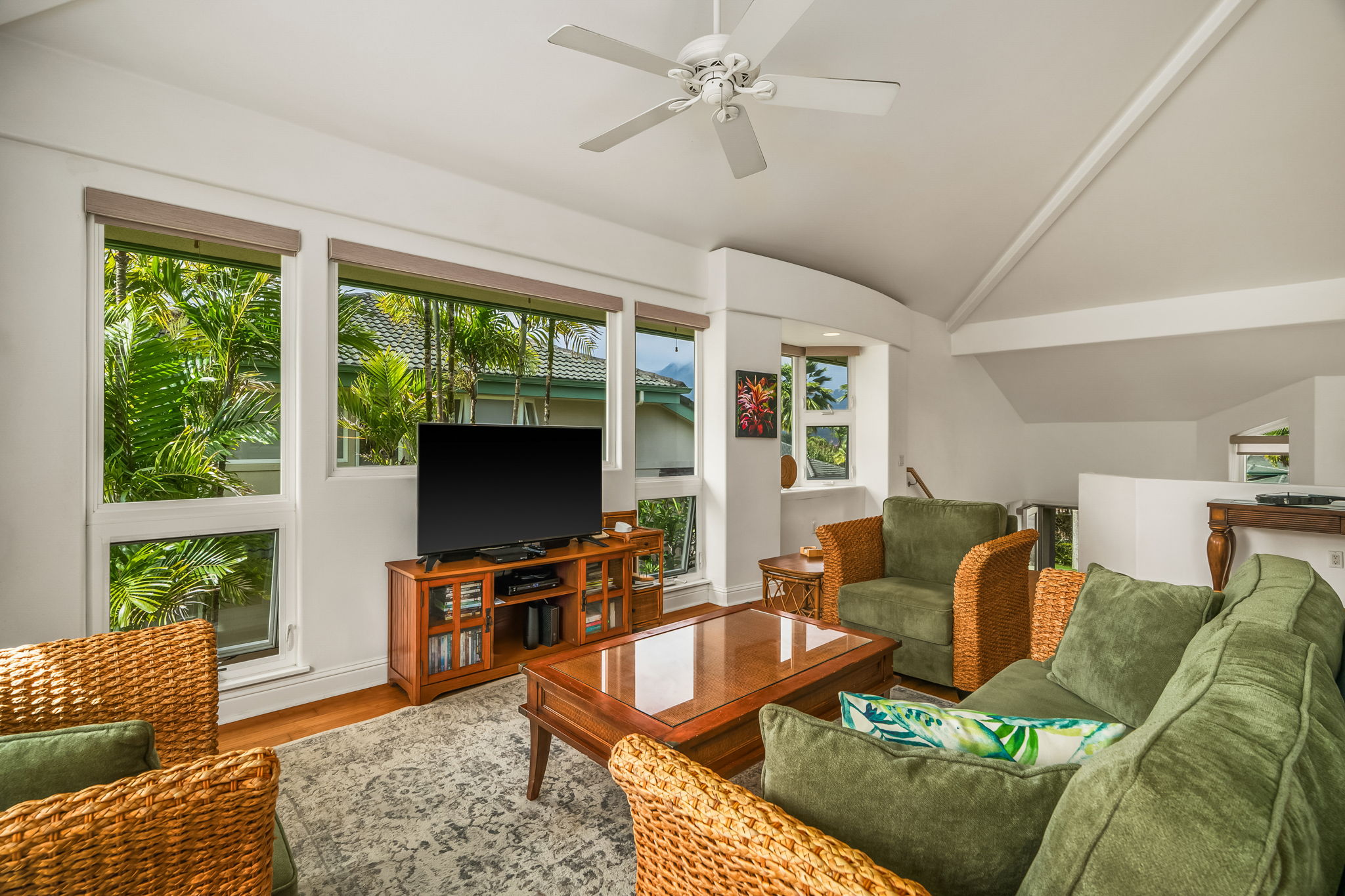 4141 Lei O Papa Road, Unit 6 Princeville, HI 96722 - Photo 10 of 26 a living room with furniture and a flat screen tv