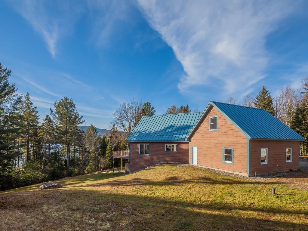 201 Pleasant Island Road Oquossoc, ME 04964 - Photo 27 of 31 side of home