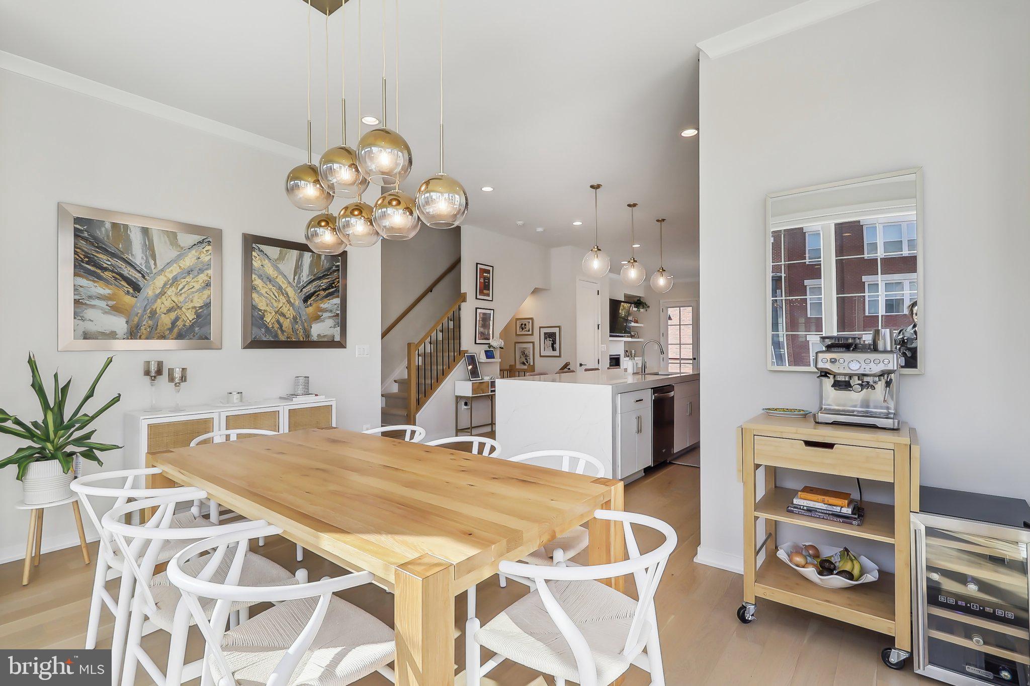 1970 Roland Clarke Place Reston, VA 20191 - Photo 20 of 72 a very nice looking dining room with a table and chairs in it