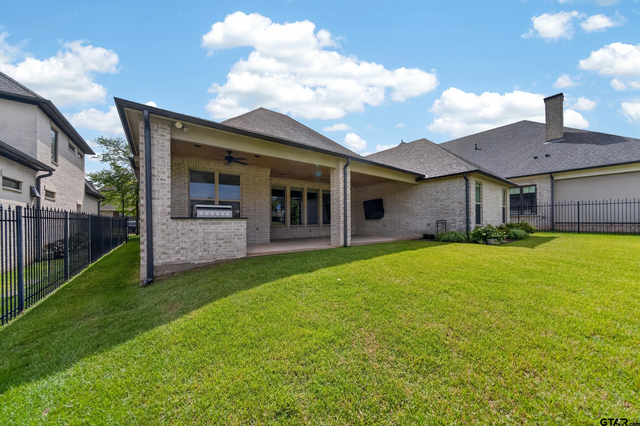 7517 Cross Gate Way Tyler, TX 75703 - Photo 30 of 47 a house view with a garden space
