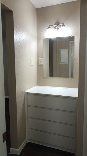 700 Franklin Boulevard Austin, TX 78751 - Photo 5 of 7 a bathroom with a sink and mirror