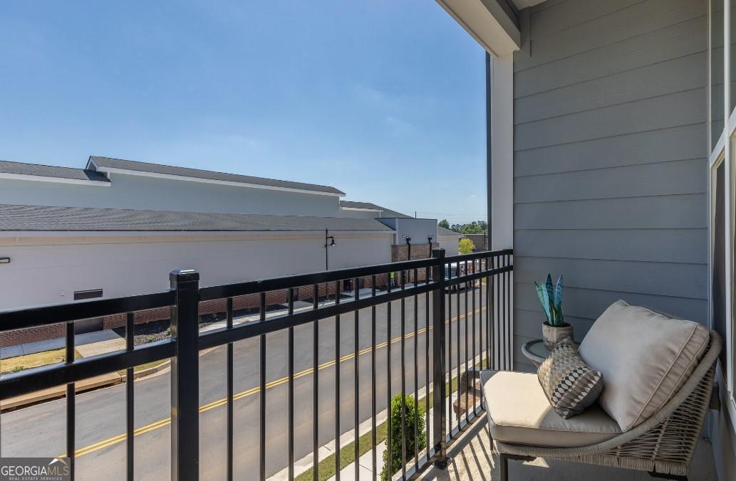 1486 Terrell Mill Road Southeast, Unit 449 Marietta, GA 30067 - Photo 7 of 25 a view of a balcony with chairs