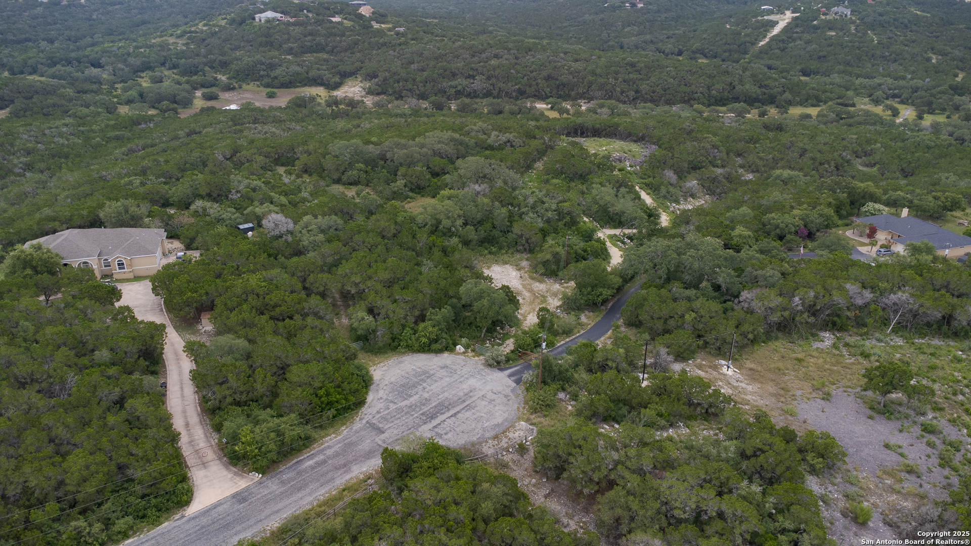 199 County Road 2733 Mico, TX 78056 - Photo 5 of 19 an aerial view of a house with yard