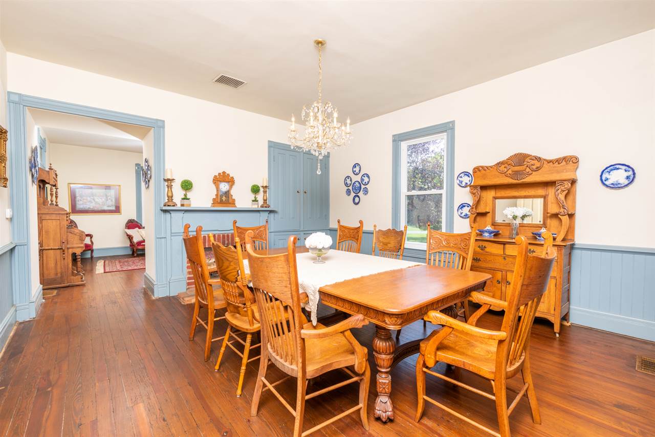 227 Baynes Road Waynesboro, VA 22980 - Photo 20 of 49 a view of a dining room with furniture and wooden floor