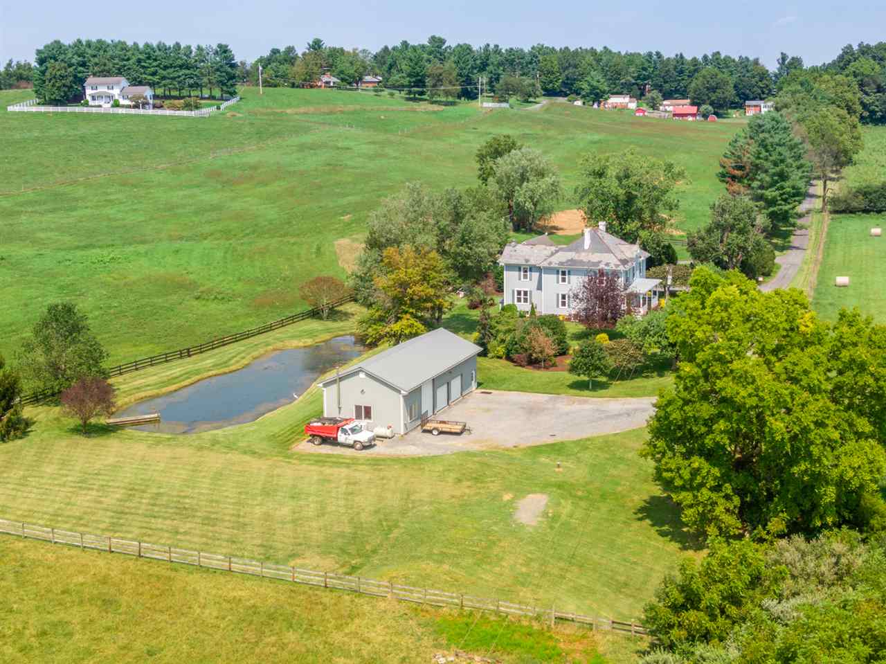 227 Baynes Road Waynesboro, VA 22980 - Photo 2 of 49 a view of a lake with a yard