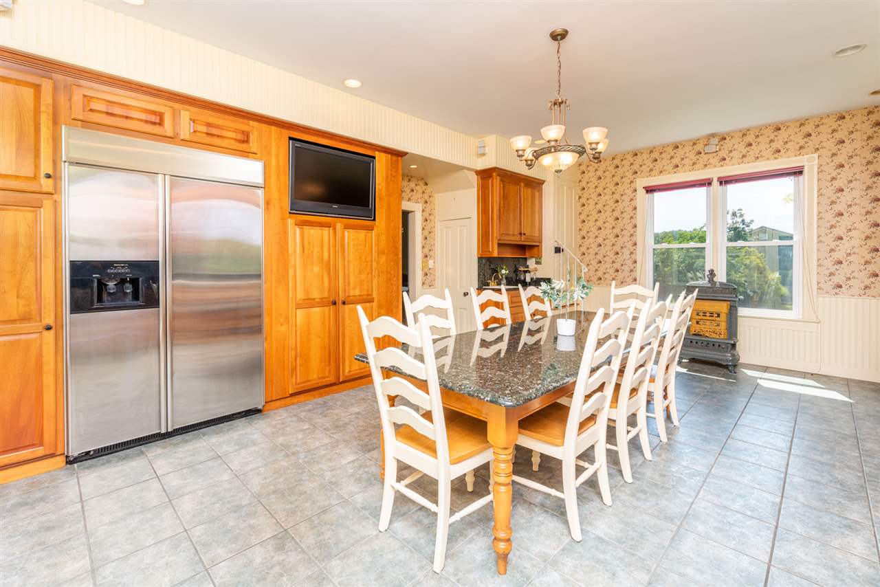 227 Baynes Road Waynesboro, VA 22980 - Photo 22 of 49 a view of a dining room with furniture window and outside view