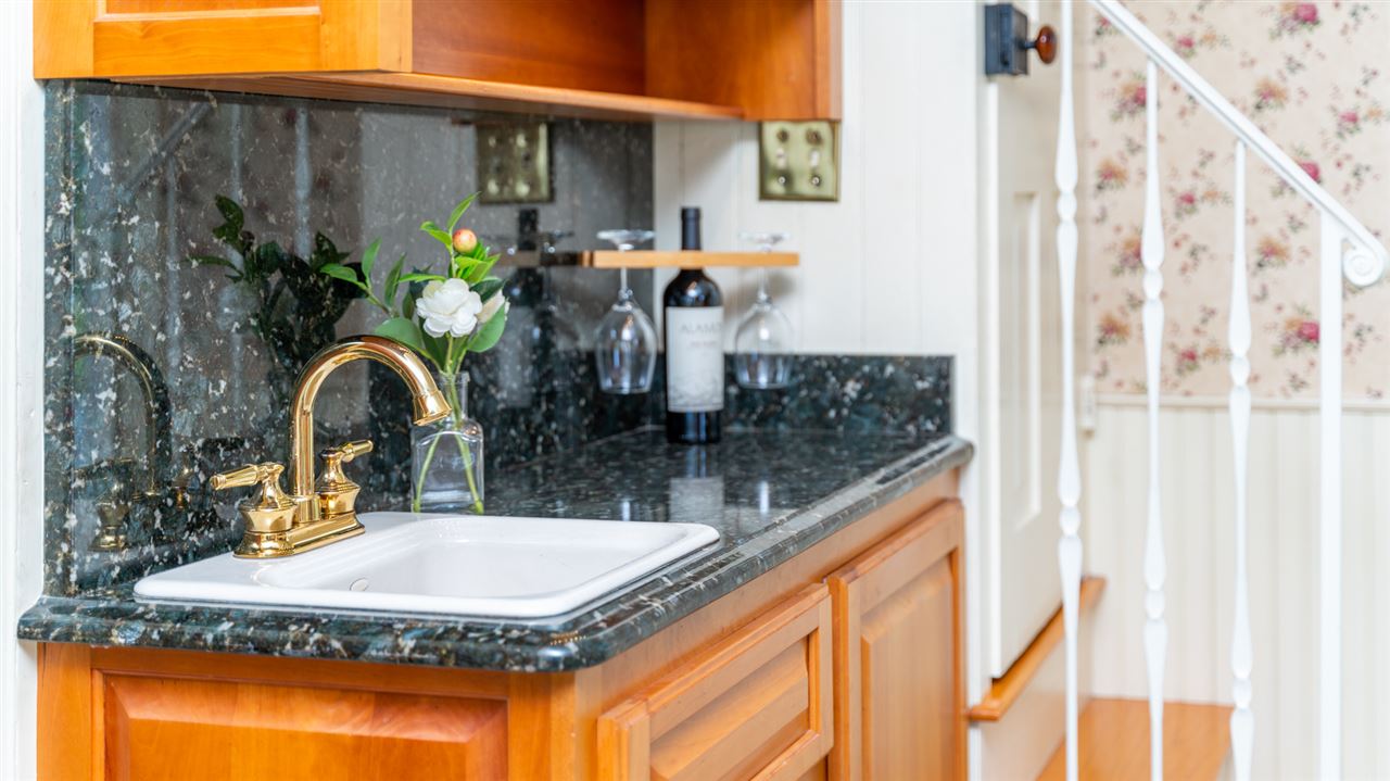 227 Baynes Road Waynesboro, VA 22980 - Photo 27 of 49 a bathroom with a granite countertop sink and a mirror