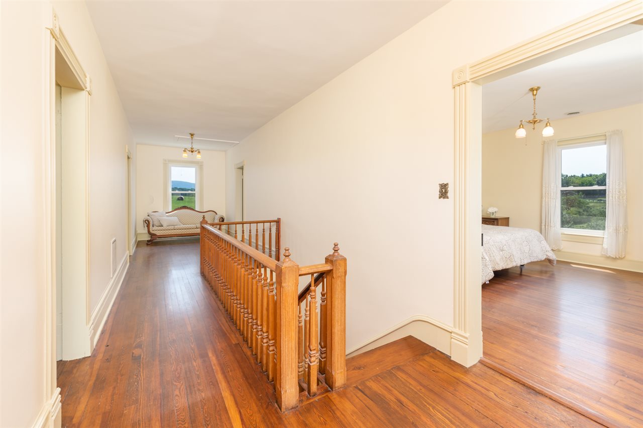227 Baynes Road Waynesboro, VA 22980 - Photo 28 of 49 a view of a hallway view with wooden floor and staircase