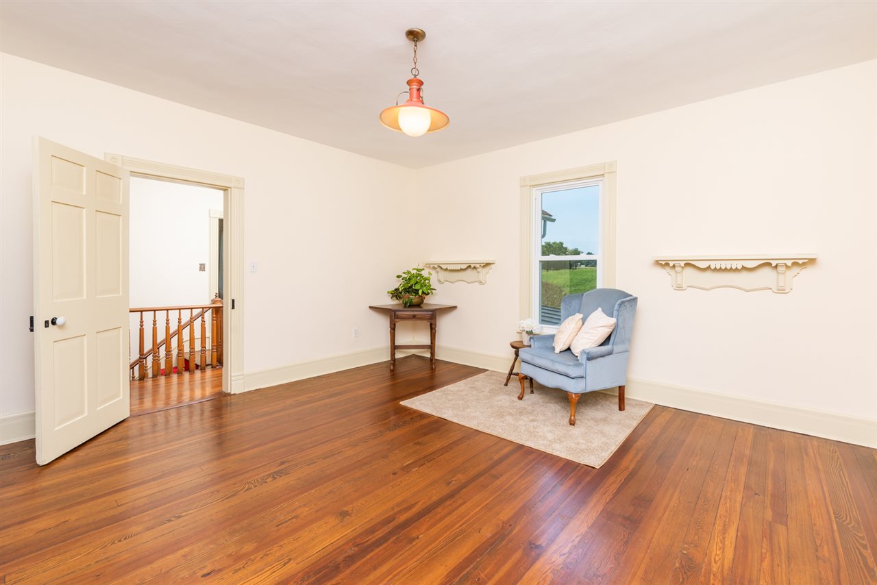 227 Baynes Road Waynesboro, VA 22980 - Photo 33 of 49 a living room with furniture and wooden floor