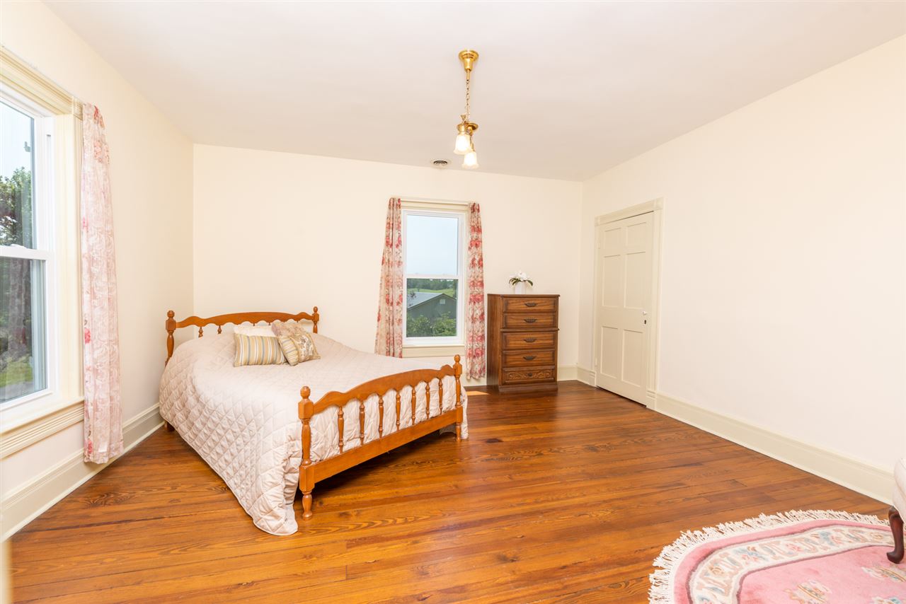 227 Baynes Road Waynesboro, VA 22980 - Photo 35 of 49 a bedroom with a bed and window