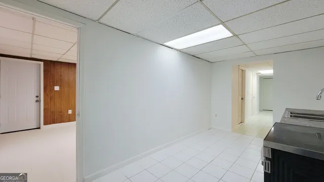 a view of empty room with windows