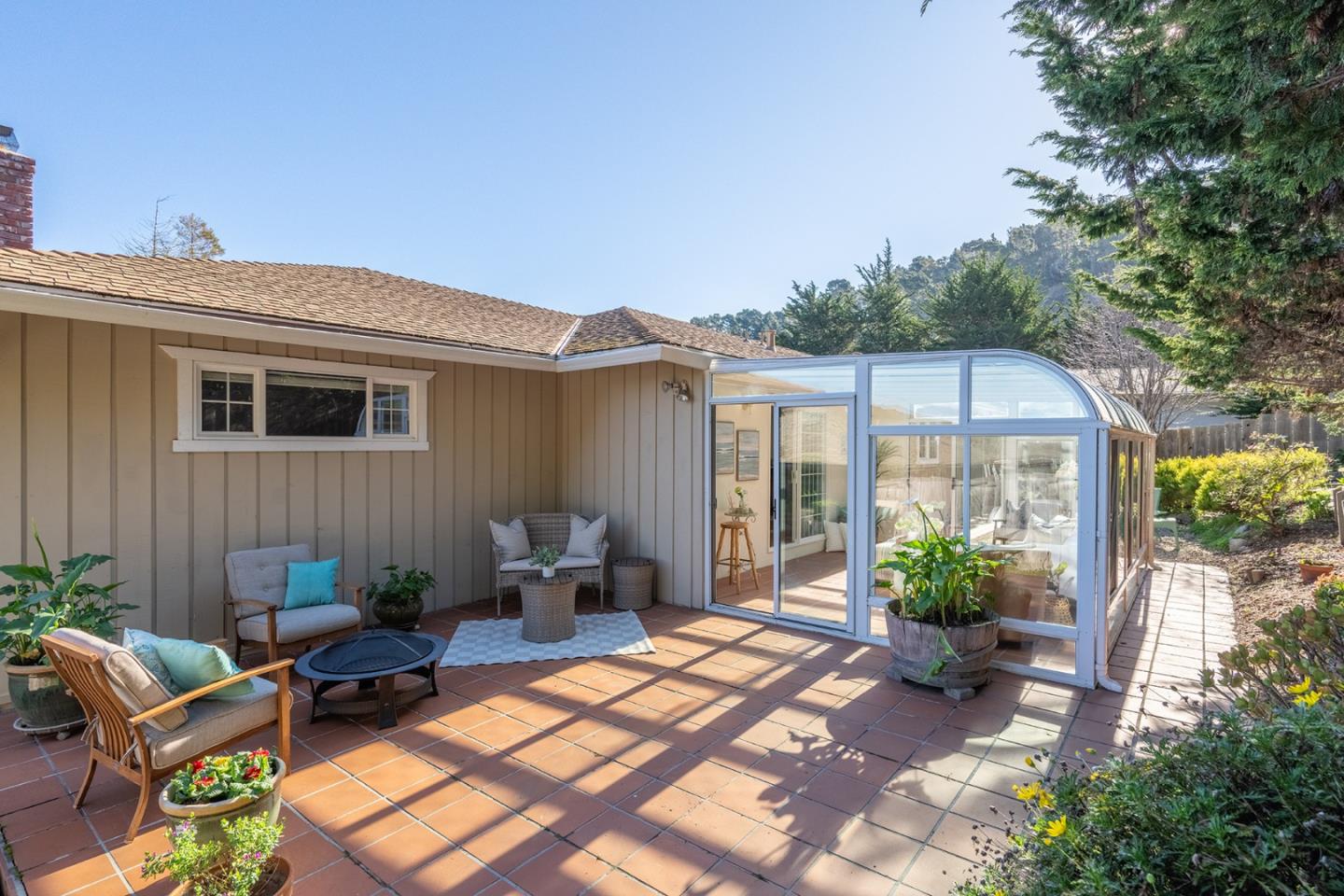 3050 Ribera Road Carmel, CA 93923 - Photo 21 of 27 a backyard of a house with seating space