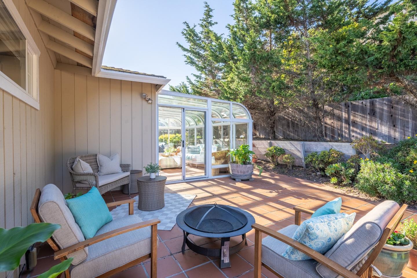 3050 Ribera Road Carmel, CA 93923 - Photo 22 of 27 a backyard of a house with seating space