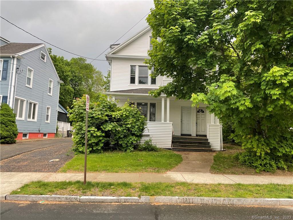 53 Ramsdell Street New Haven, CT 06515 - Photo 1 of 1 a front view of a house with a yard