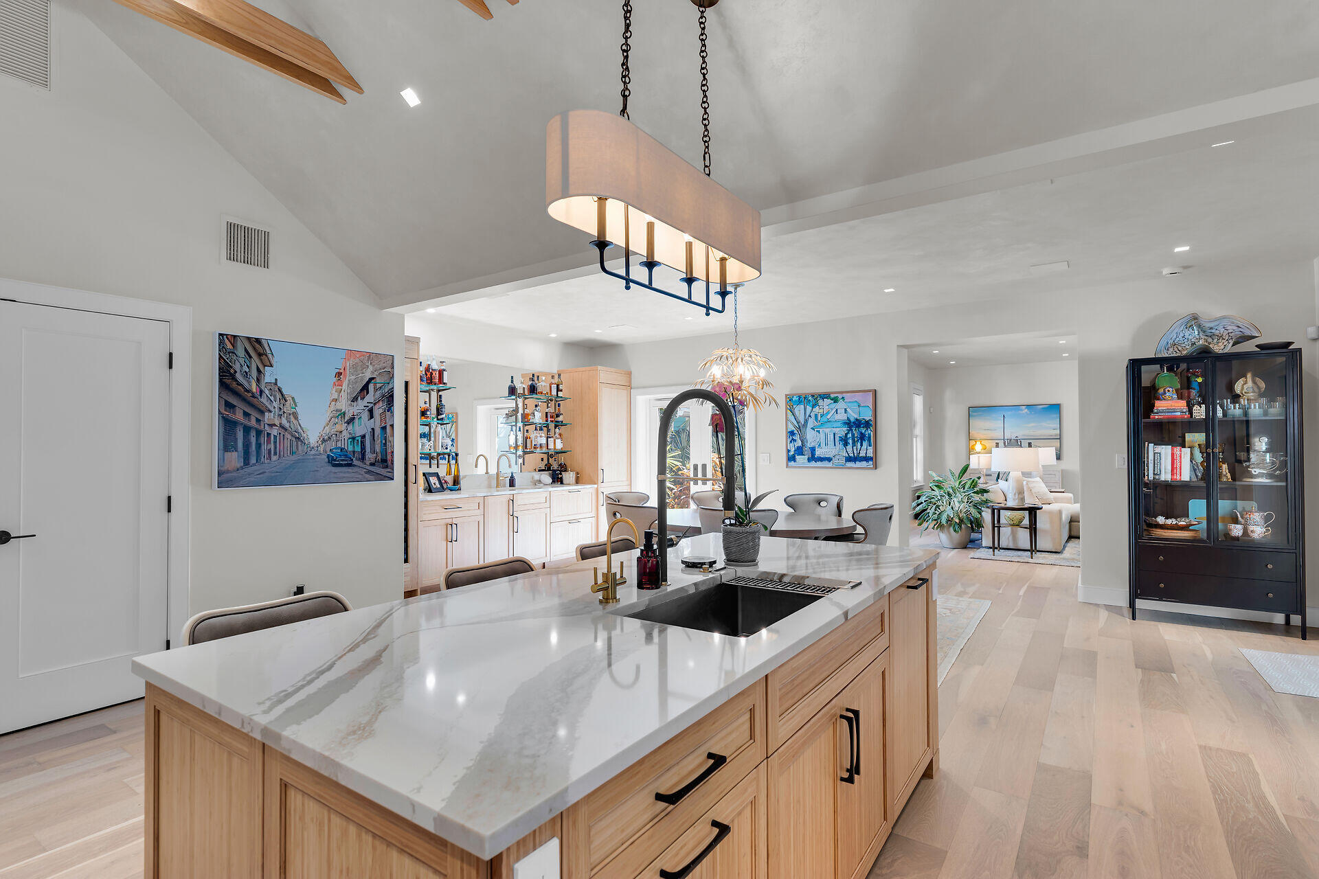 411 Louisa Street Key West, FL 33040 - Photo 13 of 71 a kitchen with stainless steel appliances granite countertop a sink a stove and a wooden floors