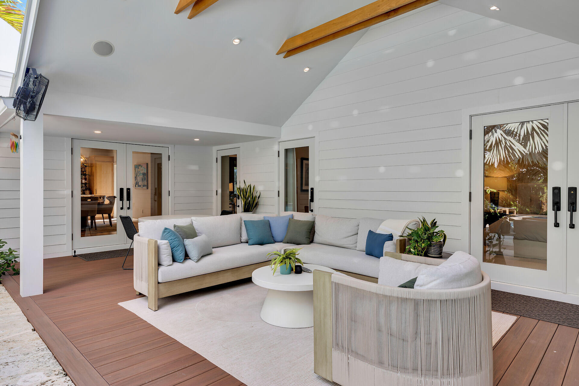 411 Louisa Street Key West, FL 33040 - Photo 20 of 71 a living room with furniture and wooden floor