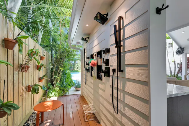 a large bedroom with a bed and a chandelier