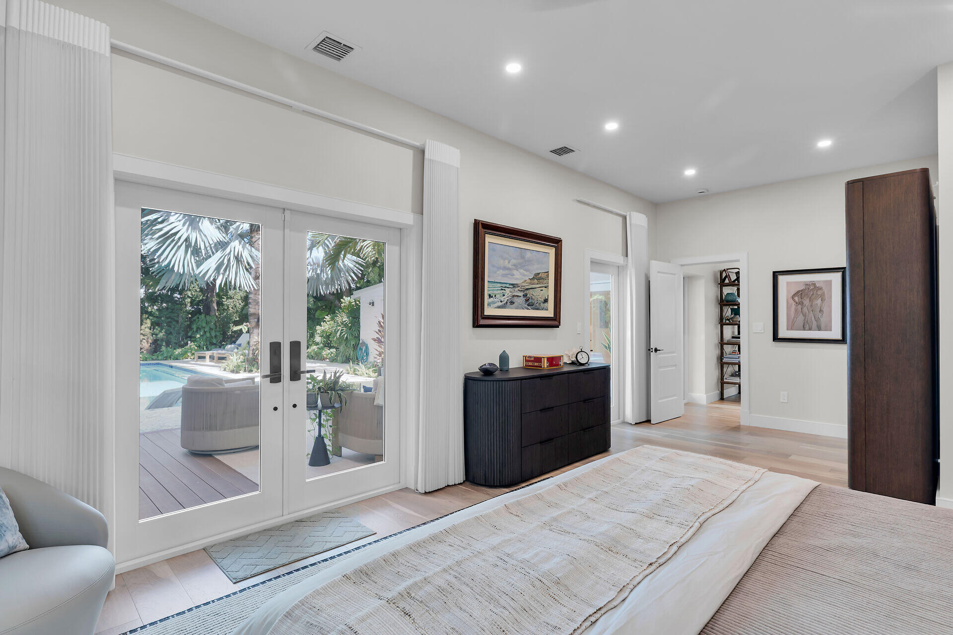 411 Louisa Street Key West, FL 33040 - Photo 28 of 71 a living room with furniture and a large window