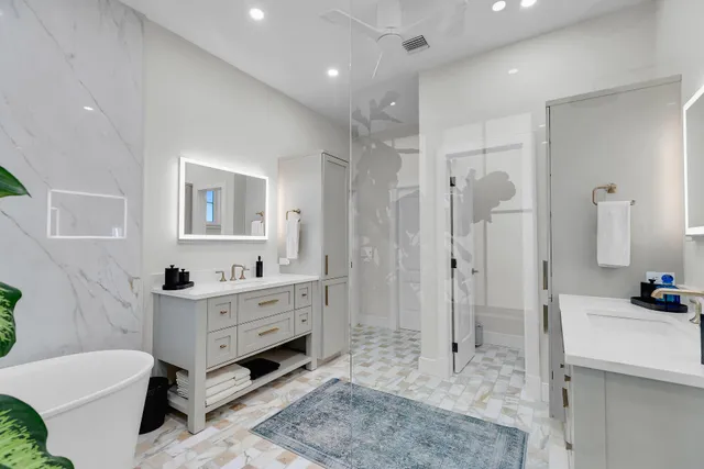 a living room with furniture and a book shelf
