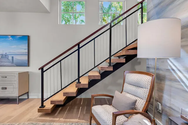 a room with furniture and a flat screen tv