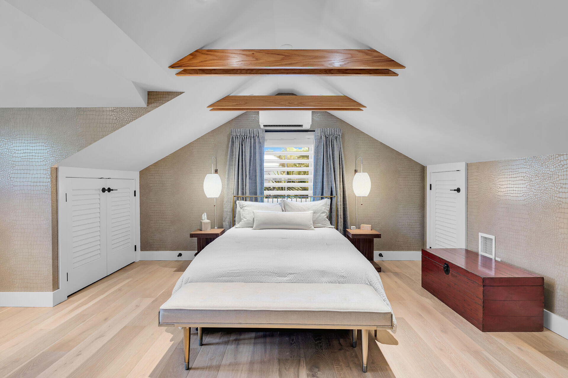 411 Louisa Street Key West, FL 33040 - Photo 33 of 71 a large bedroom with a bed and a chandelier