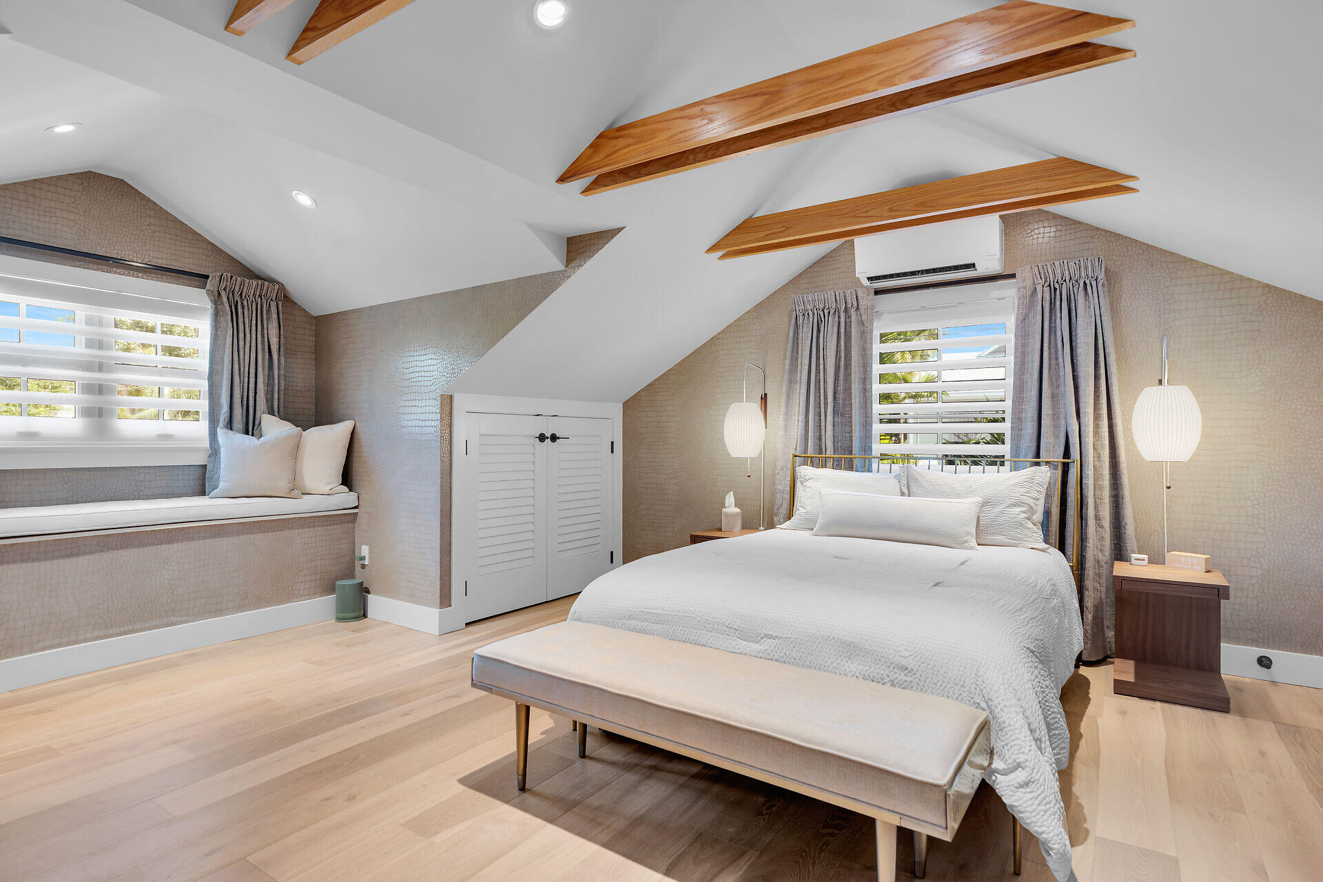 411 Louisa Street Key West, FL 33040 - Photo 34 of 71 a spacious bedroom with a large bed and windows