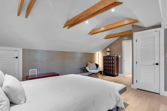 a kitchen with stainless steel appliances a sink a stove and cabinets