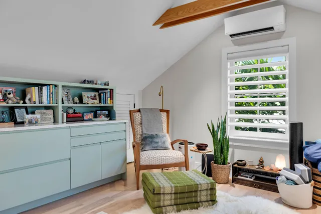 a kitchen that has a lot of cabinets in it