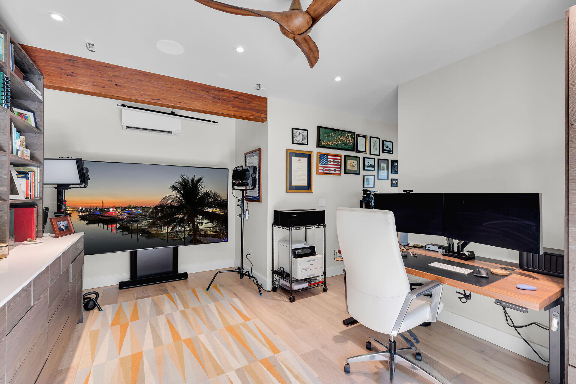 411 Louisa Street Key West, FL 33040 - Photo 43 of 71 a view of a workspace with furniture and a kitchen