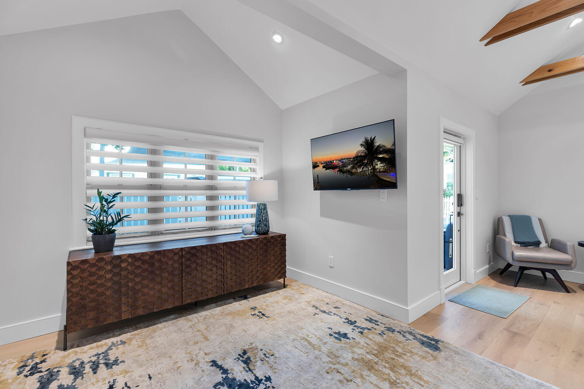 411 Louisa Street Key West, FL 33040 - Photo 59 of 71 a living room with furniture and a flat screen tv
