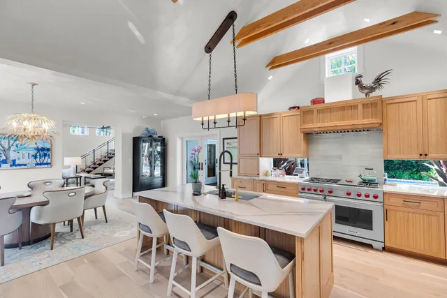 a kitchen with a stove and cabinets