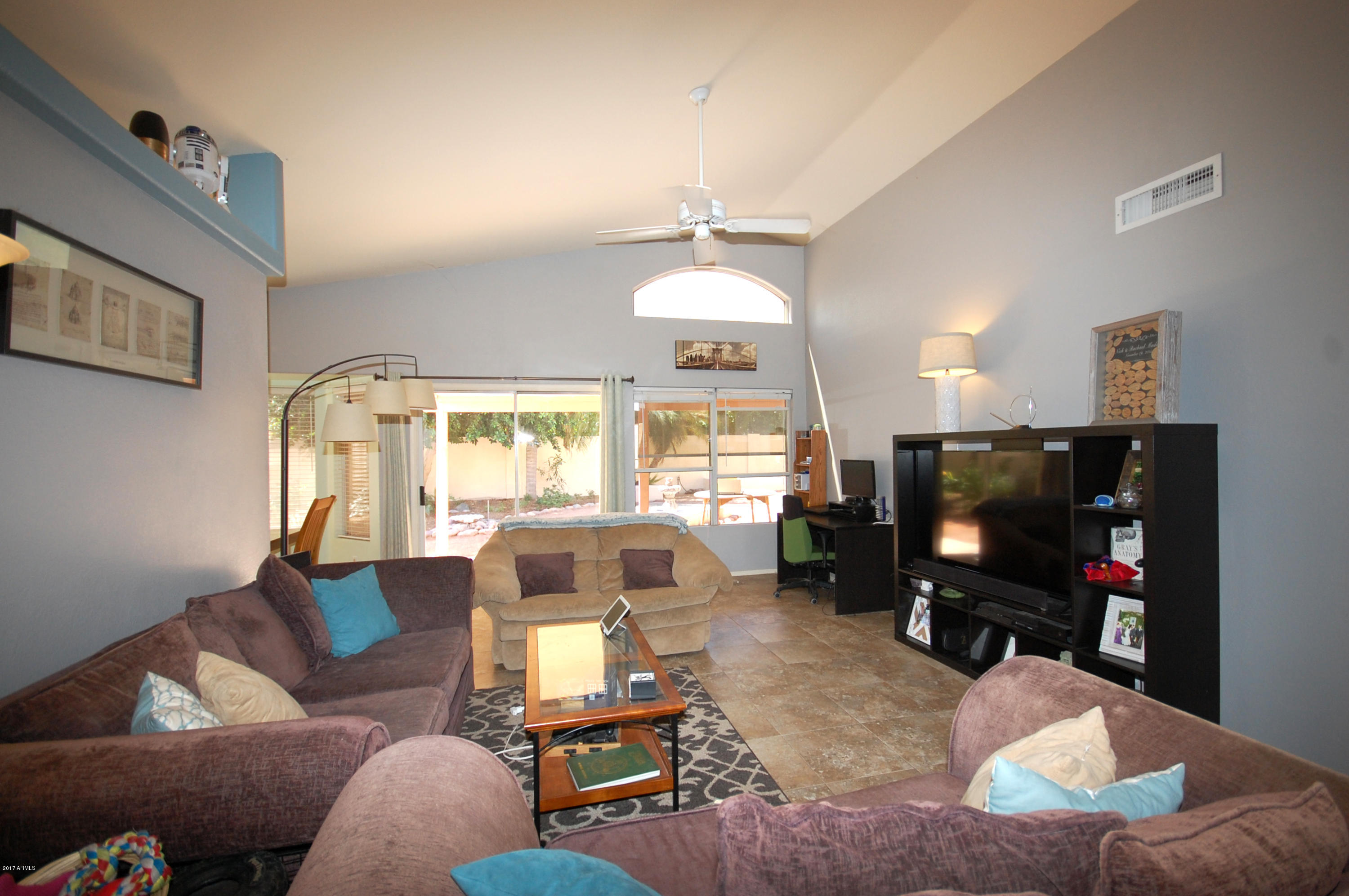 725 West Tumbleweed Road Gilbert, AZ 85233 - Photo 2 of 24 family room 2