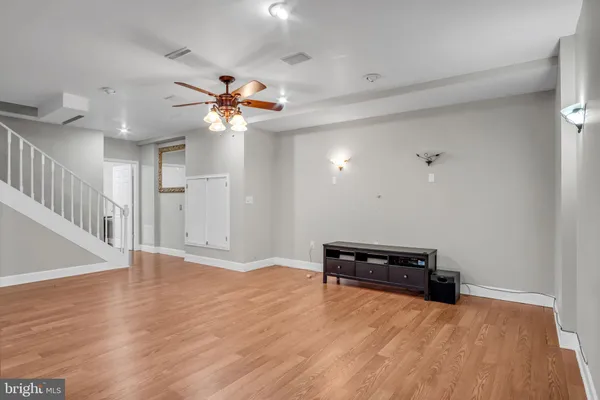 a room with furniture and pool table